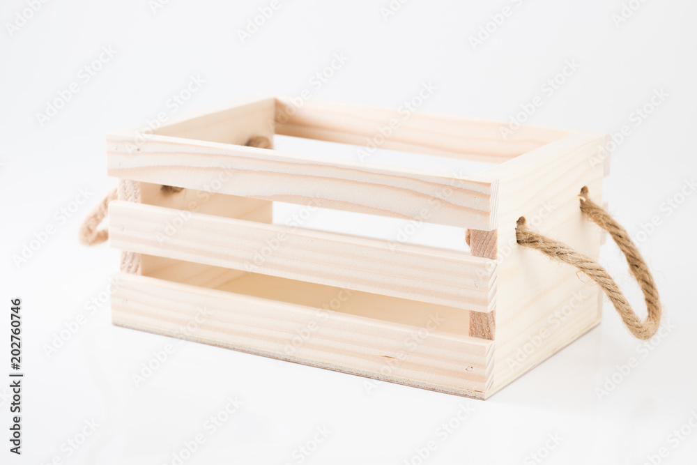 Wooden Box With Rope Handle on white background Stock Photo