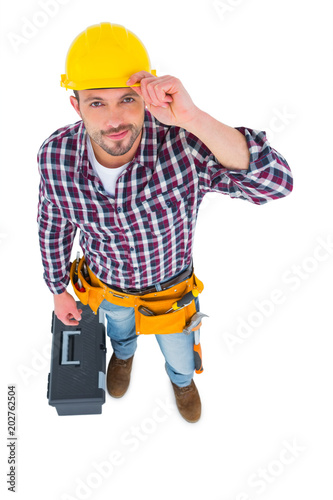 Smiling handyman with tool box  © WavebreakmediaMicro