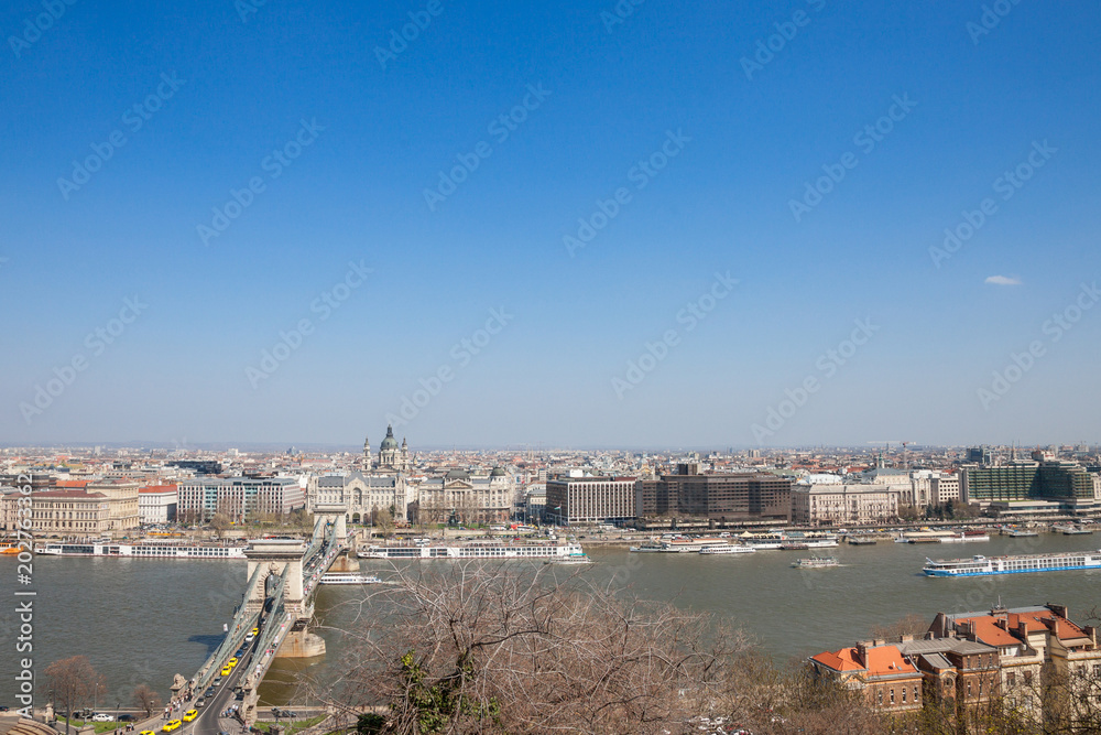 Aerial view of Budapest, with the Danube river, Szechenyi chain bridge, and Szent Istvan Basilica. Budapest is the capital city of Hungary and one of the main touristic destinations in the region