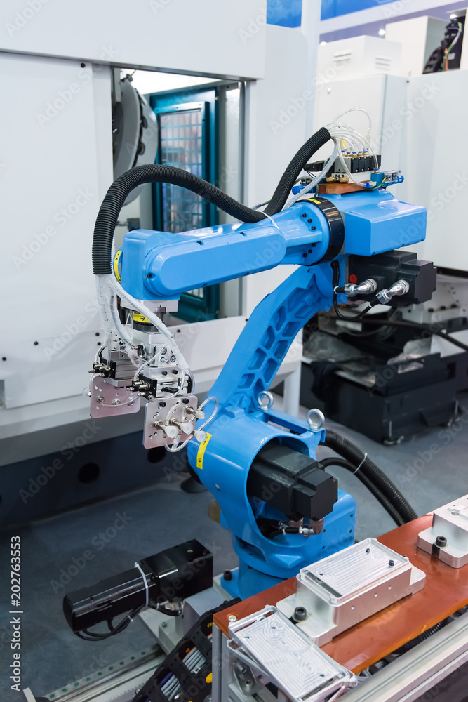 robotic machine tool in industrial manufacture plant,Smart factory industry 4.0 concept. robotic machine tool in industrial manufacture plant,Smart factory industry 4.0 concept.