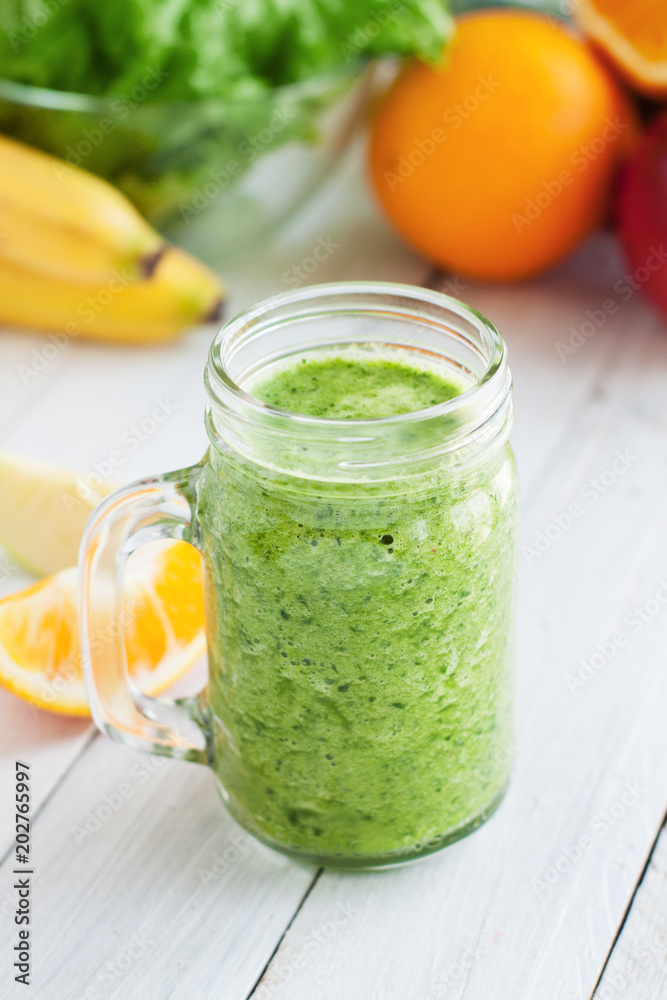 Health smoothie with green kale, apple and banana Health smoothie with green kale, apple and banana