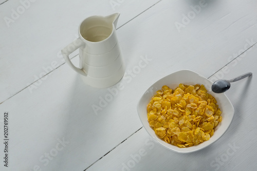 Bowl of wheaties cereal with spoon photo