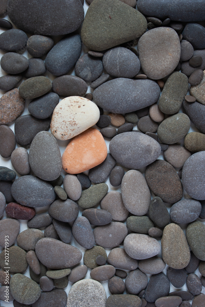 Many stones of different shapes and shades.Background. Many stones of different shapes and shades.Background.