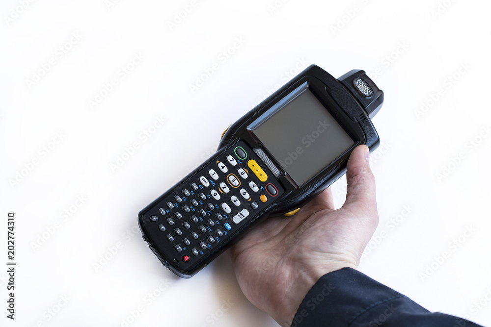 Barcode scanner in hand on white isolate background Barcode scanner in hand on white isolate background