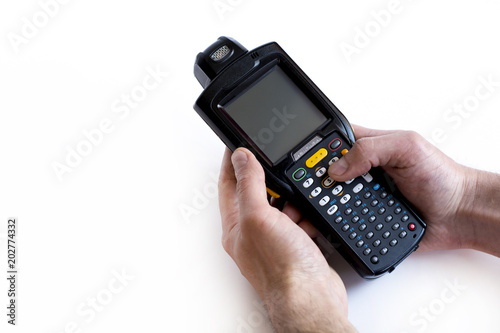 Barcode scanner in hand on white isolate background