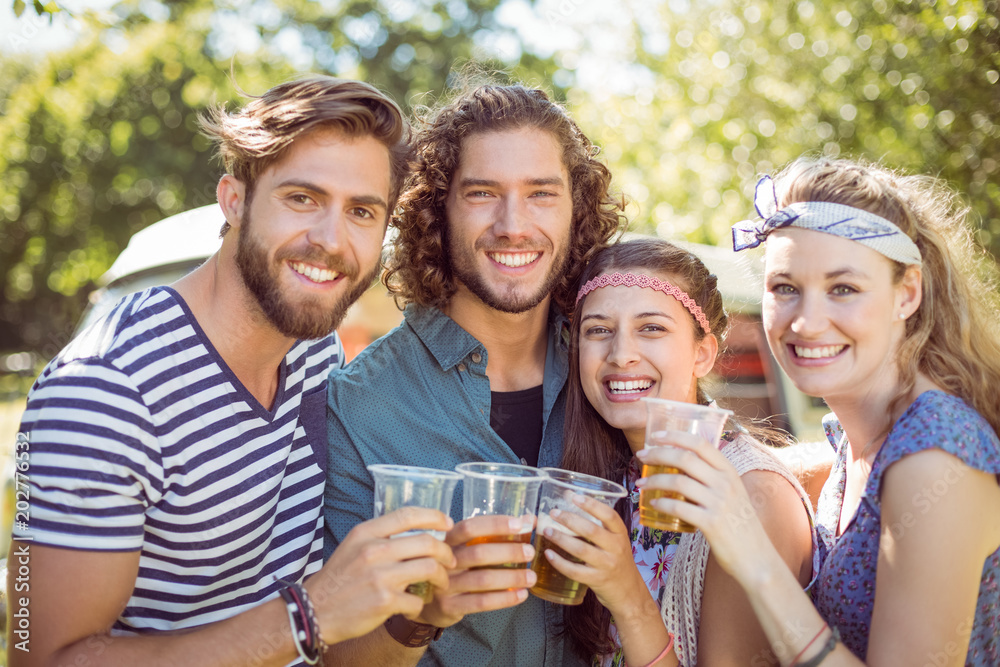 Hipster friends having a beer together Hipster friends having a beer together