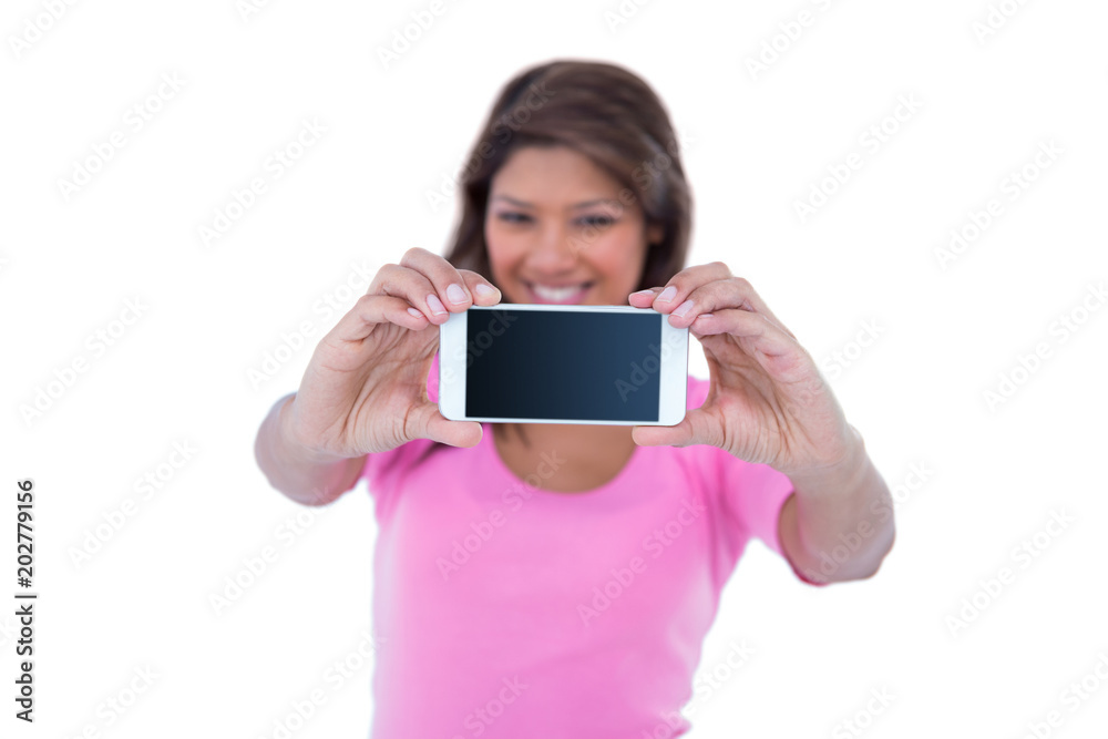 Pretty brunette taking a selfie with smartphone Pretty brunette taking a selfie with smartphone