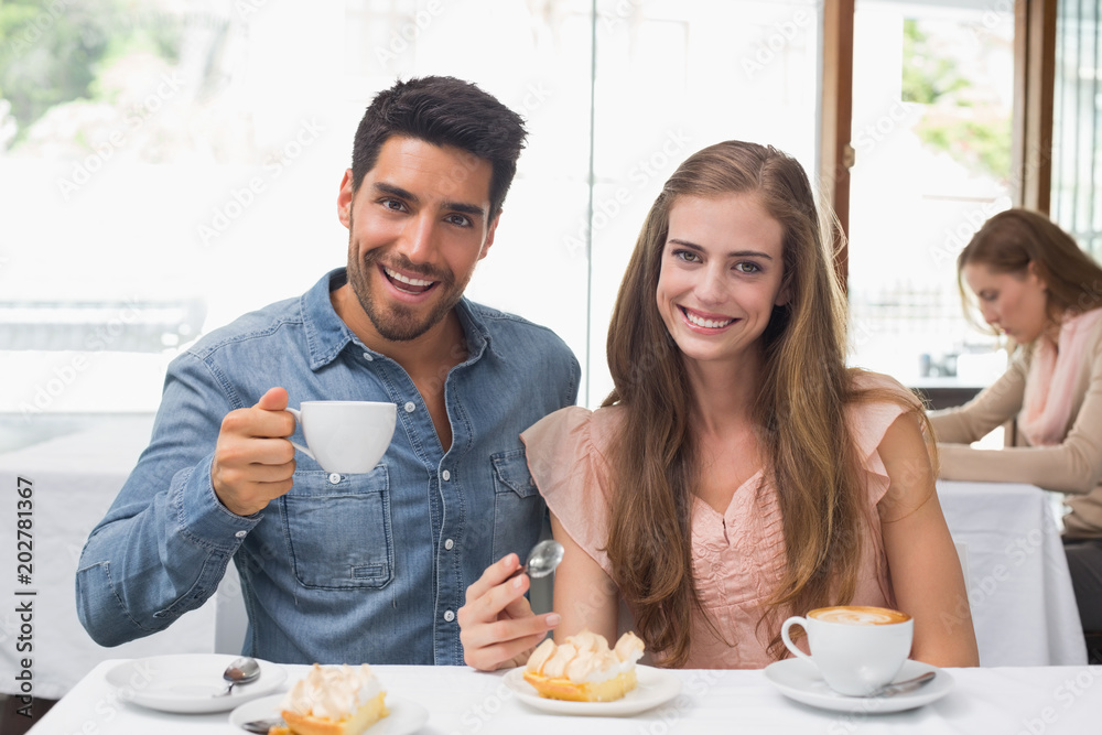 Couple having coffee at coffee shop Couple having coffee at coffee shop