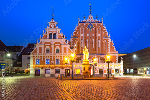 City Hall Square with House of the Blackheads and Saint Roland Statue in Old Town of Riga at night, Latvia