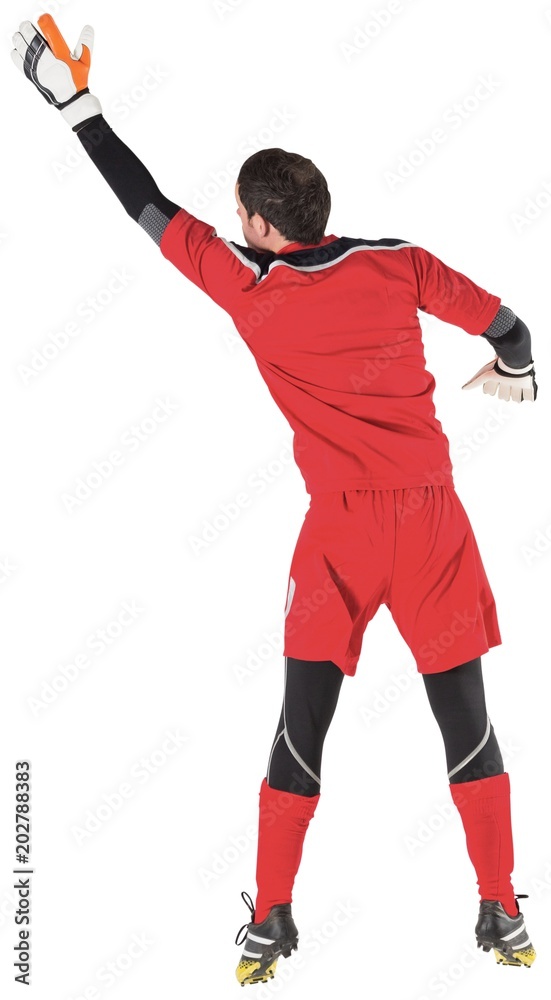 Fit goal keeper jumping up Fit goal keeper jumping up