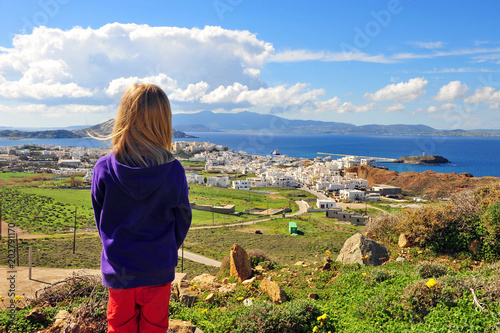 Little traveller standing at panoramic point of Naxos photo