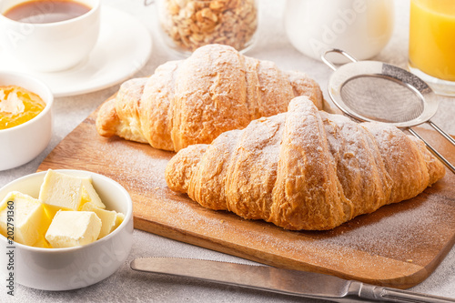 Continental breakfast with fresh croissants, orange juice and coffee