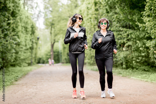 Two women running in the park