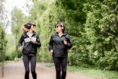 Two women running in the park