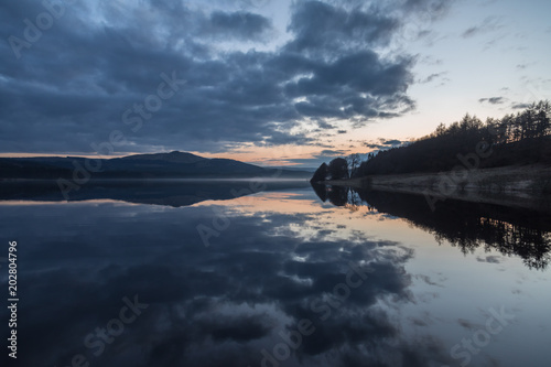 Sunset reflection at Carron Valley reservoir, Scotland