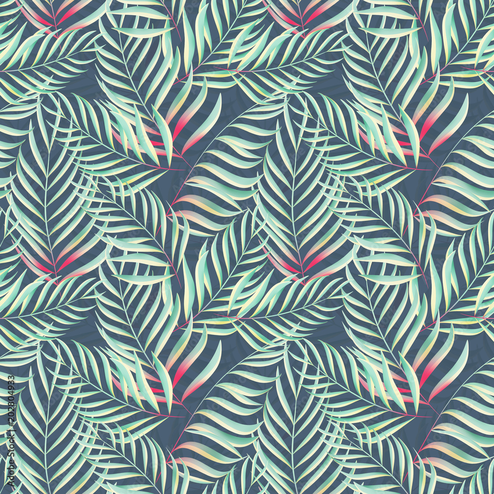 Seamless tropical pattern . Colorful palm leaves on blue background.
