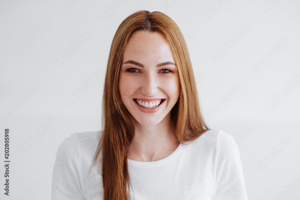 Girl smiles on white Girl smiles on white
