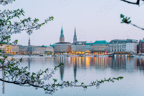 Beautiful view of Hamburg town hall - Rathaus and Alster river at spring earning evening photo