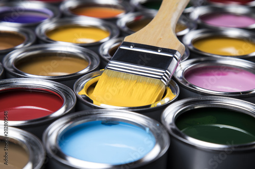 Fototapeta Naklejka Na Ścianę i Meble -  Open paint cans with a brush, Rainbow colors