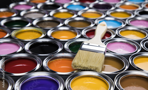 Fototapeta Naklejka Na Ścianę i Meble -  Colorful paint cans with paintbrush