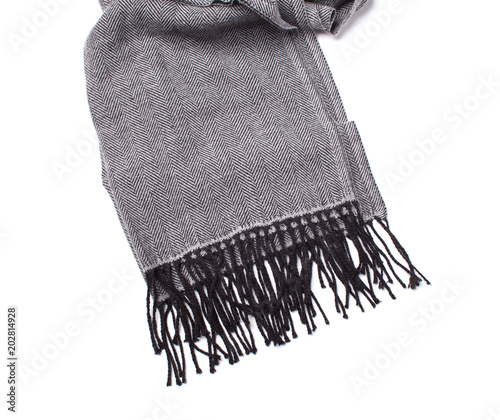 classic gray scarf with black fringe isolated on white bakcrgound