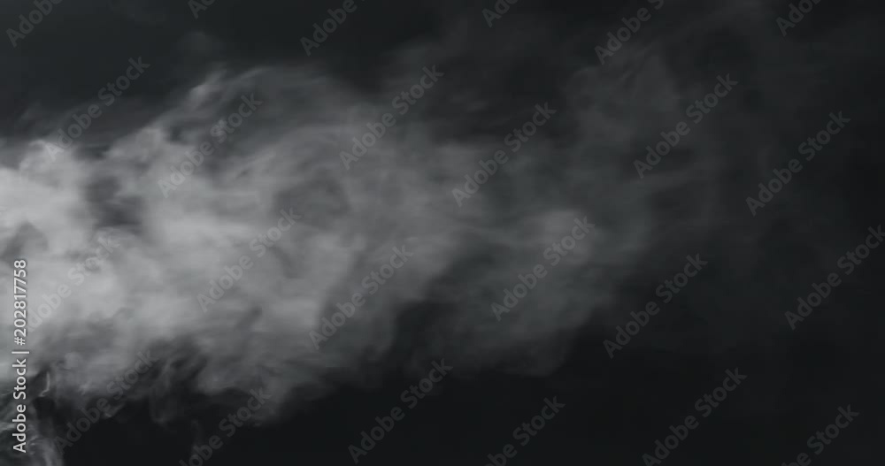 slow motion vapor steam from left over black background slow motion vapor steam from left over black background
