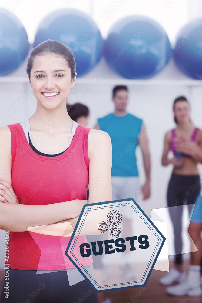Φωτογραφία The word guests and smiling woman with friends in background at fitness studio a