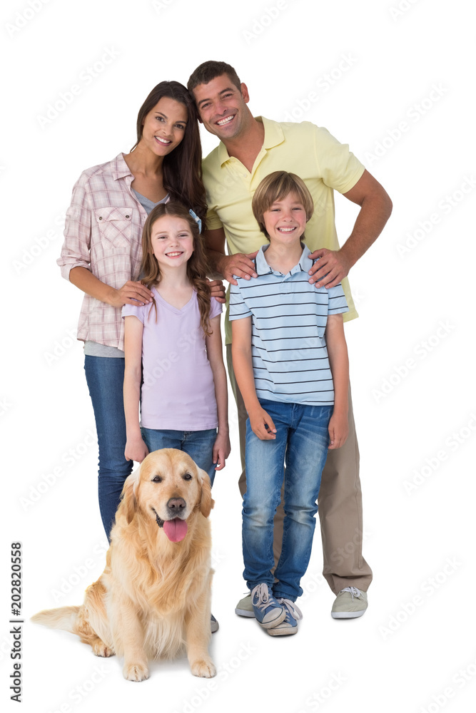 Happy family standing with dog