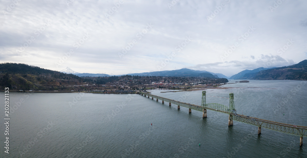 custom made wallpaper toronto digitalAerial panorama of a bridge going over Columbian River between Oregon and Washington during a winter day.