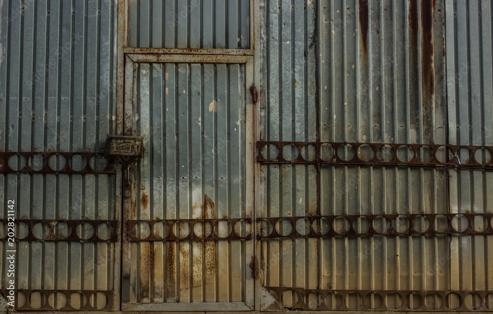 abstract metal industrial concept door and fence in old factory
