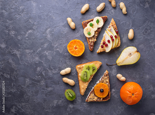 Healthy  sandwiches with peanut butter and fruits