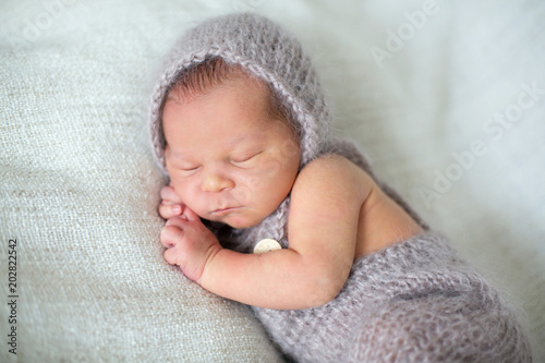Newborn baby boy, sleeping happily © Tomsickova