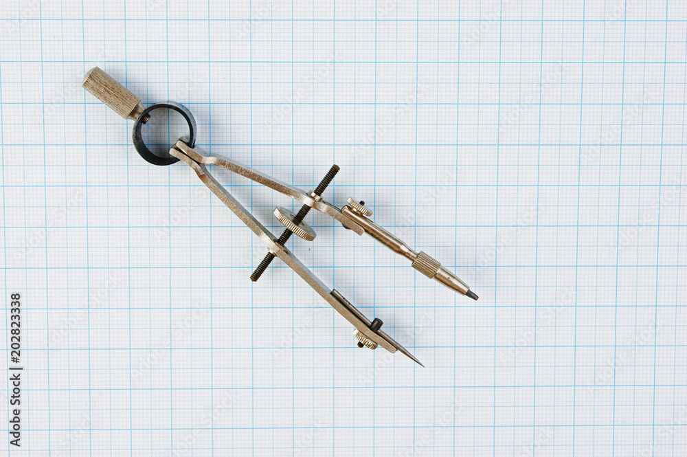 Old drawing tools on graph paper Old drawing tools on graph paper