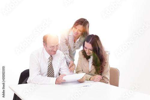 business team discussing a working paper