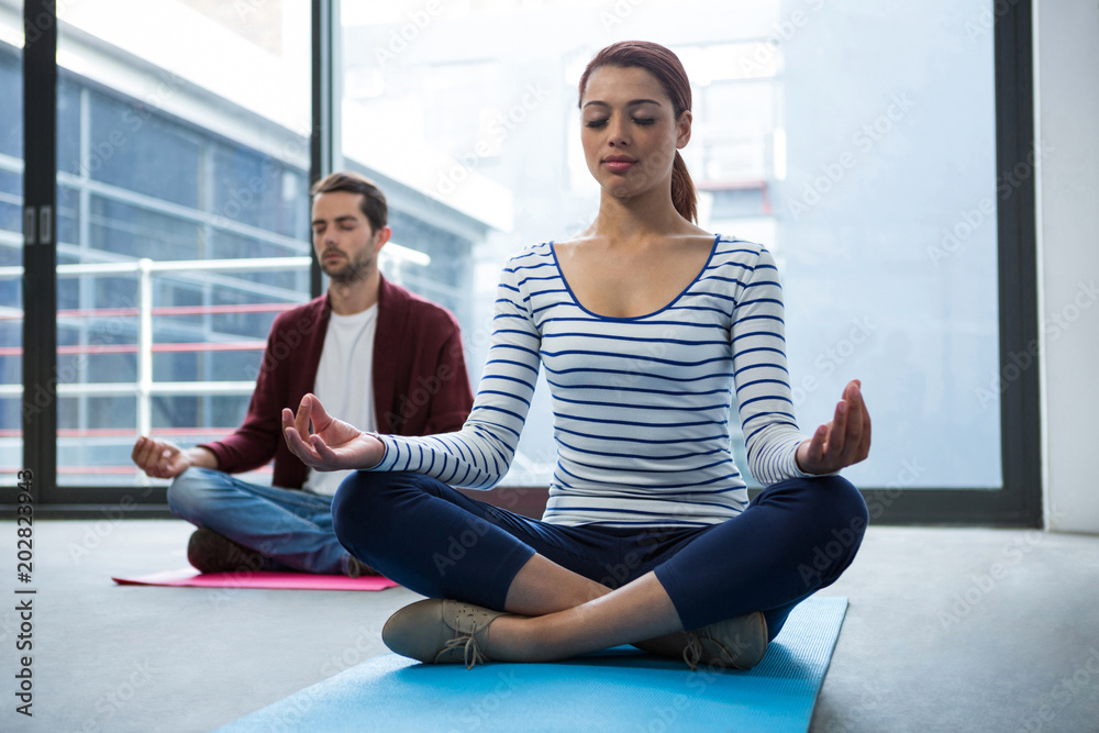 Man and woman doing yoga Man and woman doing yoga