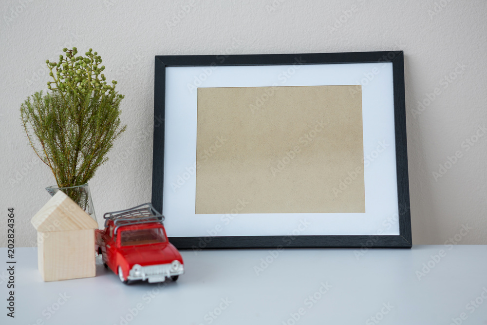 Fotografie Toy car with picture frame