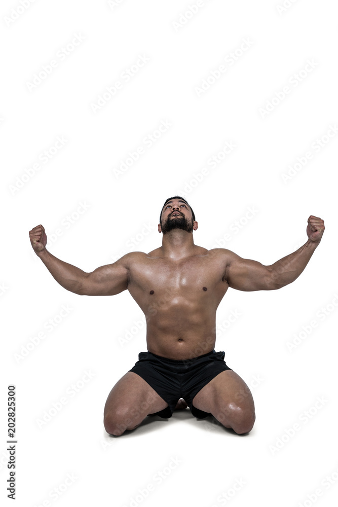 Muscular man flexing for camera Muscular man flexing for camera