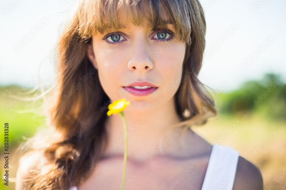 Pretty natural blonde holding dandelion Pretty natural blonde holding dandelion