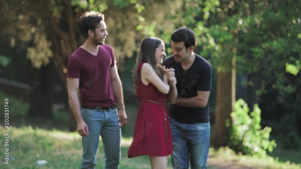 portrait of funny jokes among friends at the park- freedom, nature friendship portrait of funny jokes among friends at the park- freedom, nature friendship