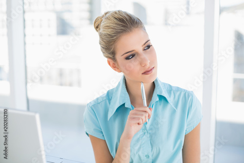 Free Download Pensive smart businesswoman posing - GFXLoad