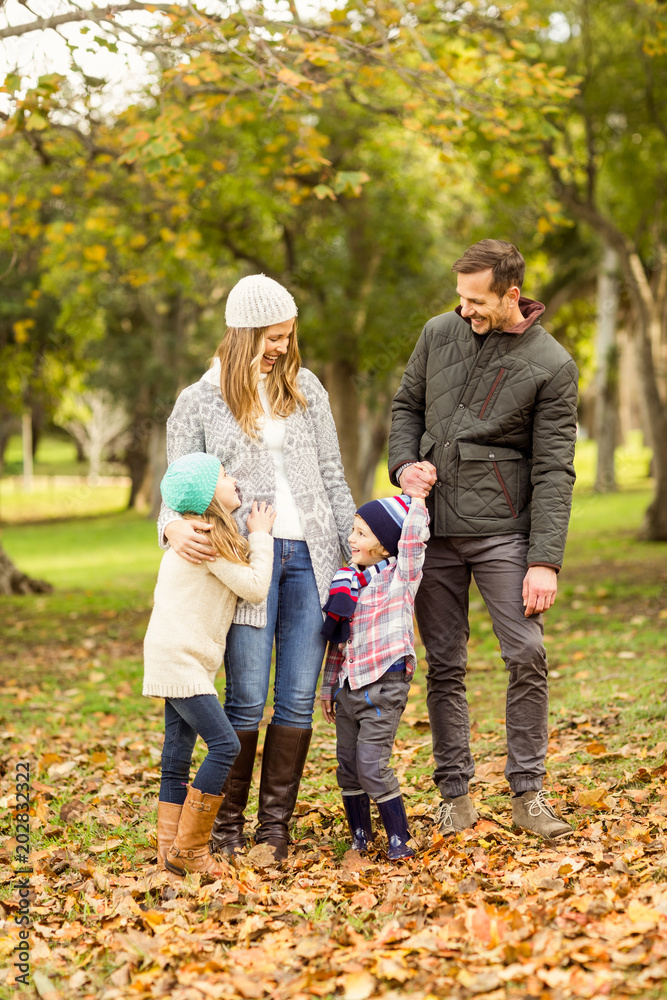 Fototapeta premium Portrait of a smiling young family