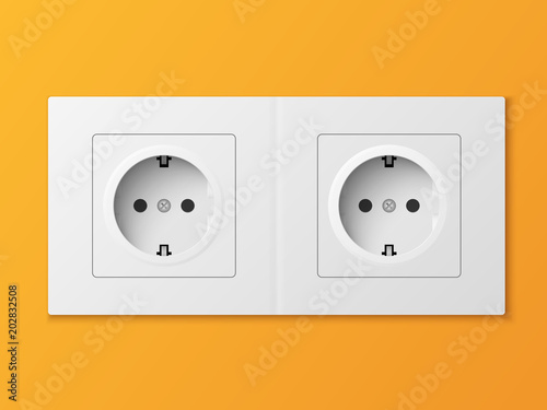 White double power socket on orange wall