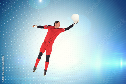 Fit goal keeper jumping up against technical screen with pixels  © vectorfusionart