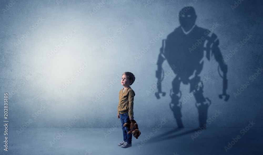 Little boy s self image appear as a big robotman shadow on his background
Little boy s self image appear as a big robotman shadow on his background
