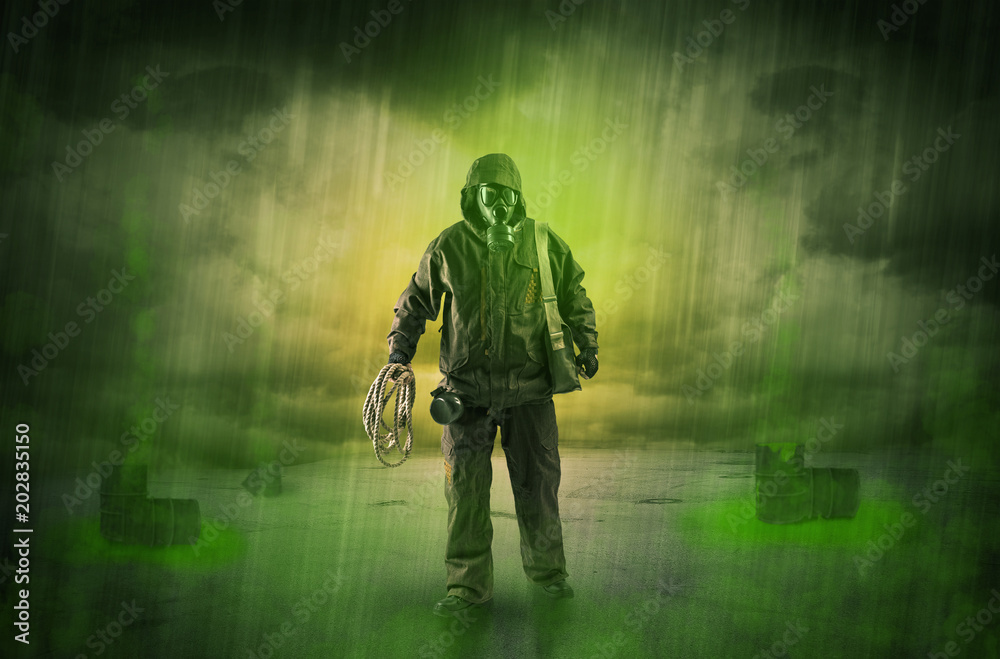 Masked unrecognizable guard in an abandoned space after explosion
Masked unrecognizable guard in an abandoned space after explosion