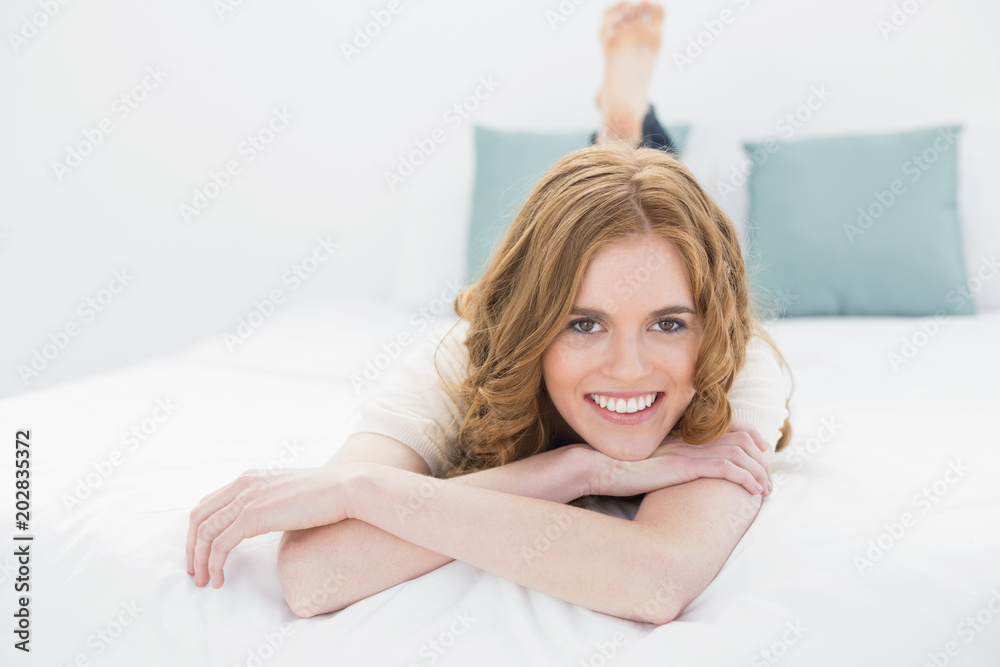 Portrait of a smiling pretty woman in bed Portrait of a smiling pretty woman in bed