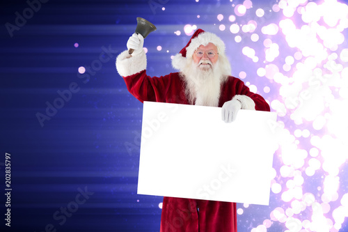 Santa holds a sign and rings his bell against light design shimmering on purple © vectorfusionart