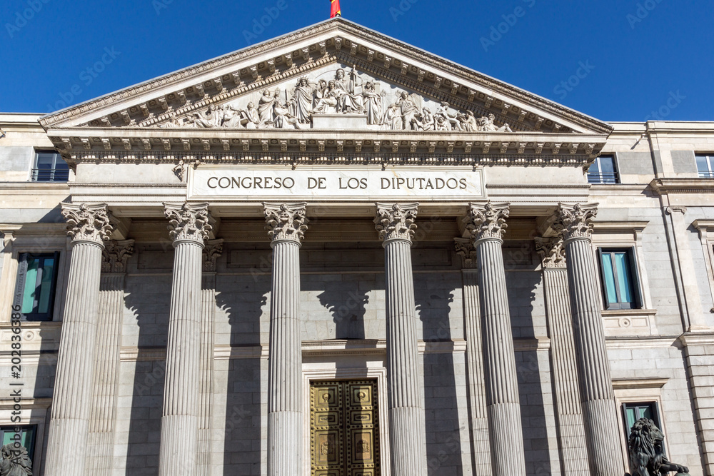  Lion sculpture in front of Building of Congress of Deputies (Congreso de los Diputados) in City of Madrid, Spain
