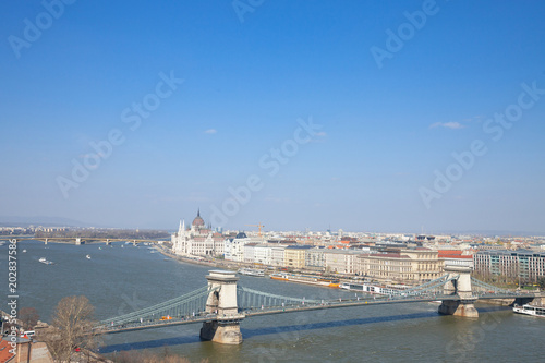 Panorama of Budapest with the Hungarian Parliament (orszaghaz) seen from the Budapest castle, the Danube river being in front with the Szechenyi bridge in front