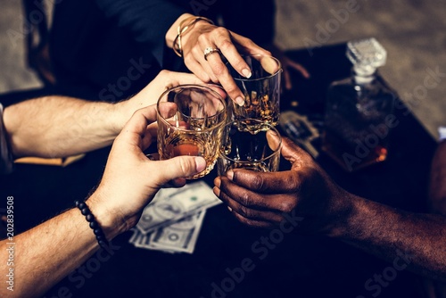 Group of people hang out drinks together